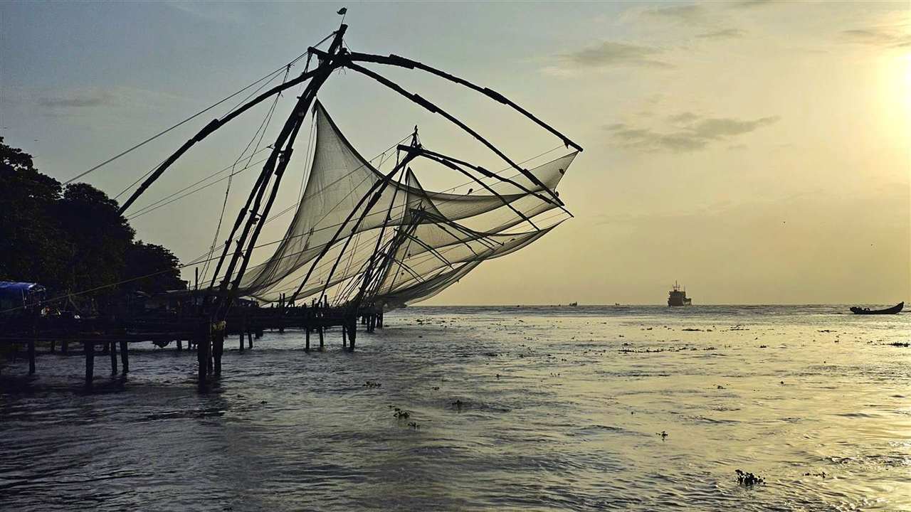 Chinese fishing nets at sunset in Fort Kochi